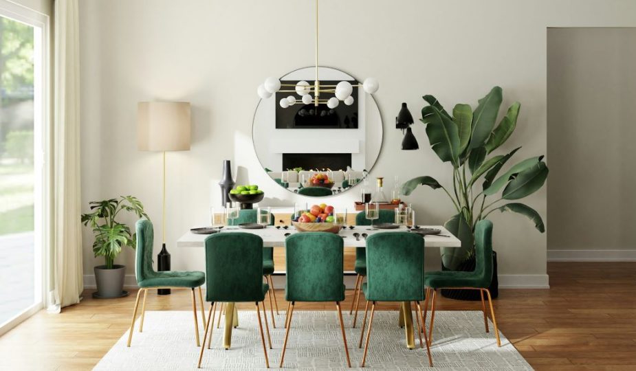 Foto de uma sala de jantar com mesa de madeira e cadeiras na cor verde.